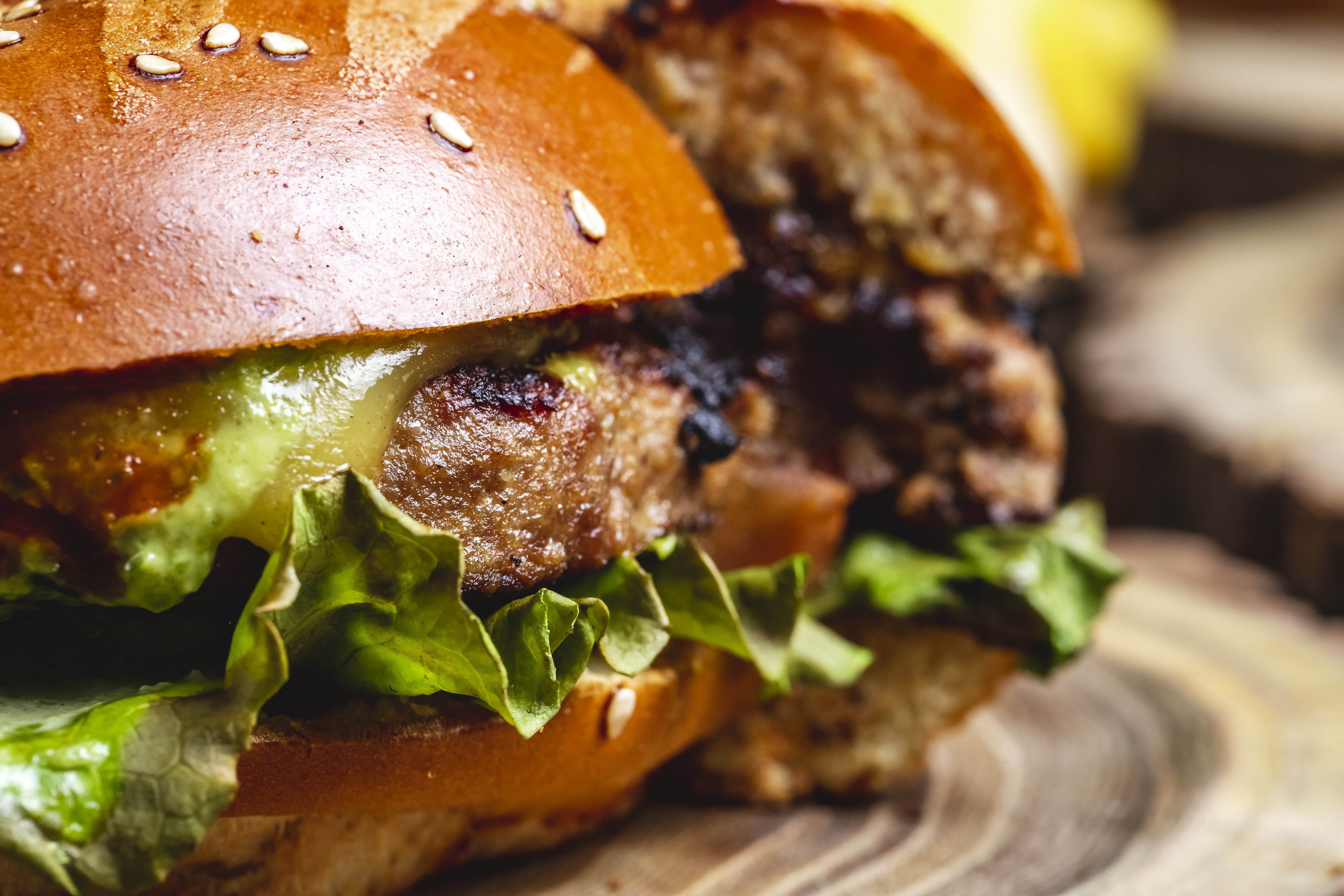 22_ZuTisch_Burger_side-view-cheeseburger-grilled-beef-patty-with-cheese-lettuce-burger-buns.jpg